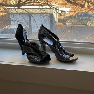 High heel sandal. Formal or casual use. Worn once to a wedding reception.